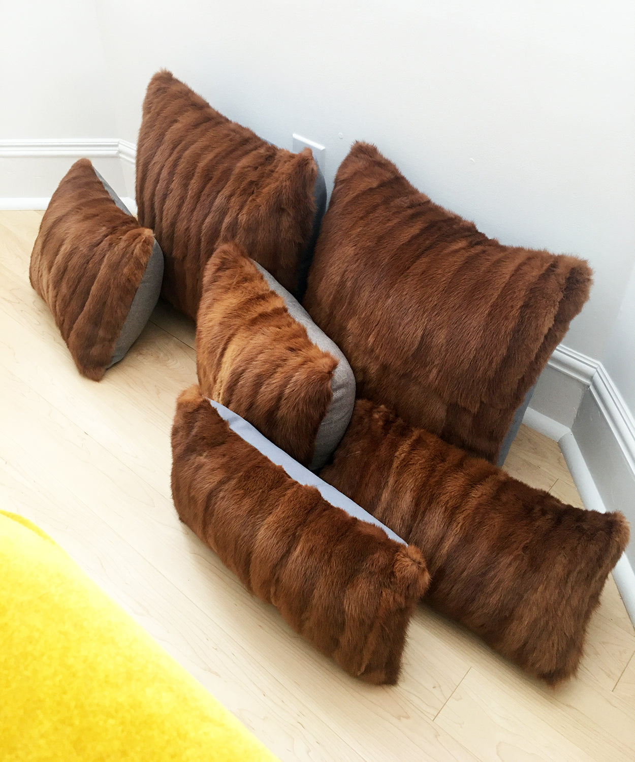 Red Mink Fur Pillows made from vintage fur coats. Reclaimed fur throw cushions made in Canada. What should I do with my fur coat?