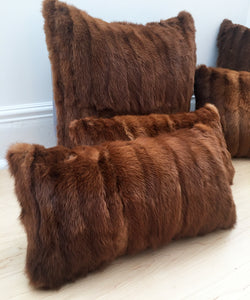 Red Mink Fur Pillows made from vintage fur coats. Reclaimed fur throw cushions made in Canada. What should I do with my fur coat?