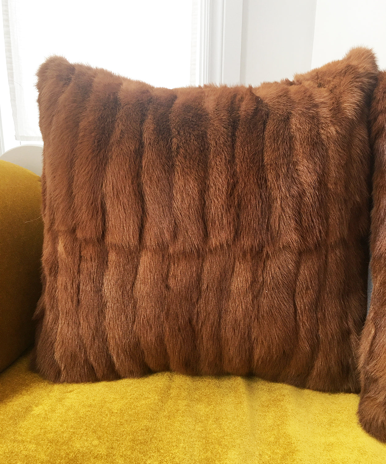 Red Mink Fur Pillows made from vintage fur coats. Reclaimed fur throw cushions made in Canada. What should I do with my fur coat?