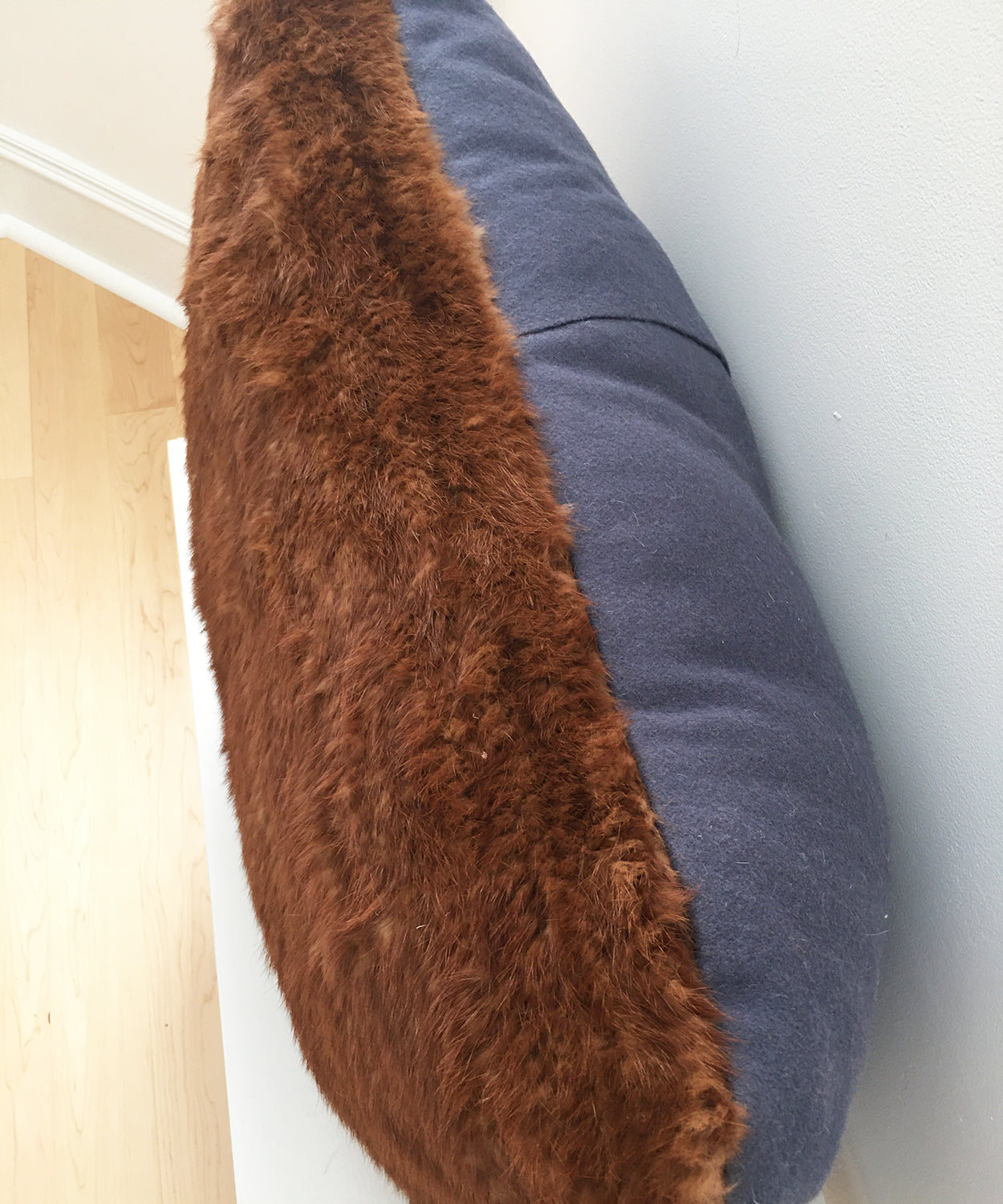 red mink fur pillow made from vintage fur coats. Giant fur pillow made in Canada. Fur coat recycling idea. What should I do with my fur coat?