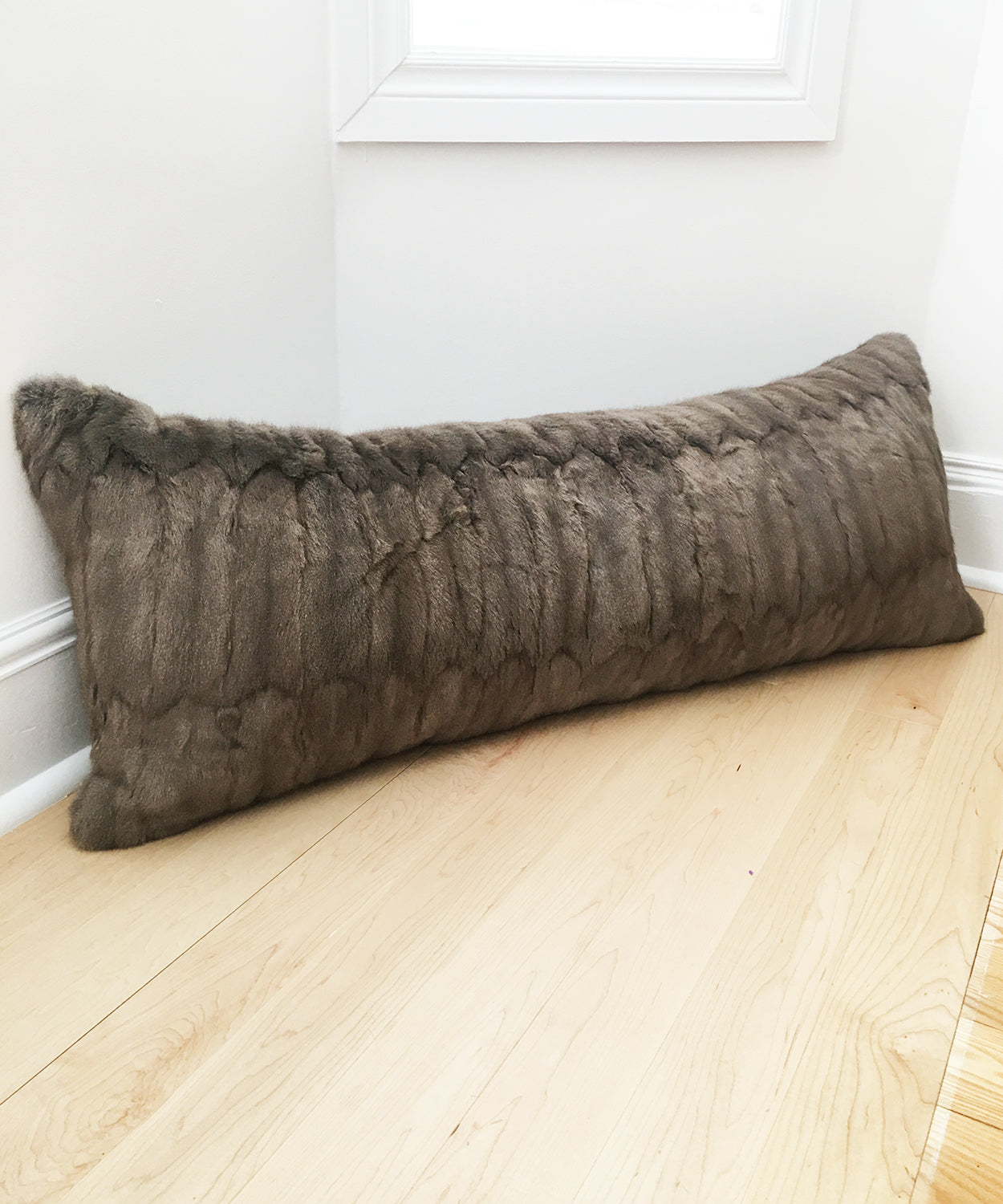 gray Russian squirrel fur body pillow made from vintage fur coats. fur upcycle idea, what should I do with my fur coat? Fur coat ideas. Made in Canada