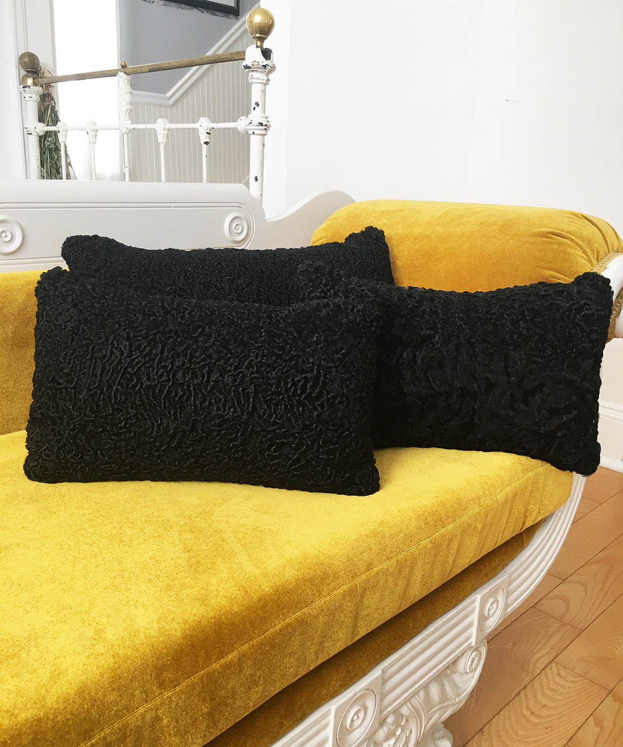 black Persian lamb fur pillow made from vintage fur coats. Cozy black furry pillow made in Canada