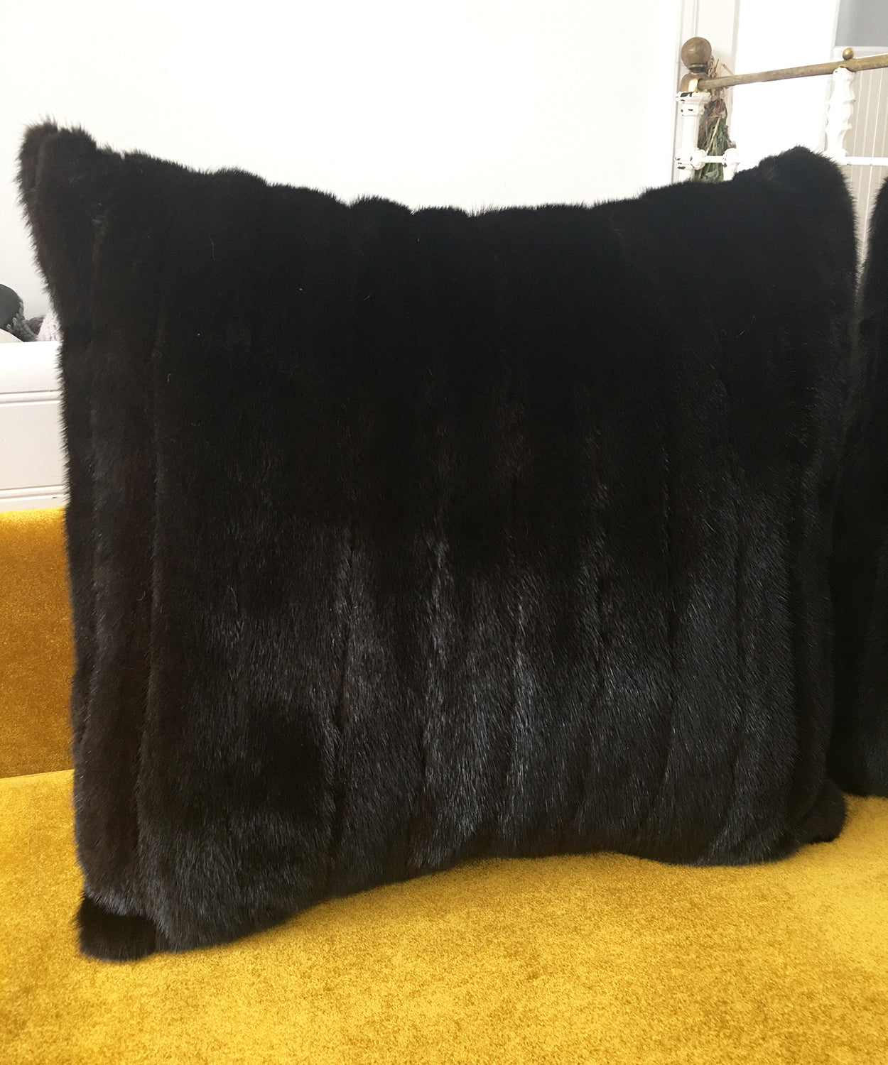 Black mink fur pillows made from vintage fur coats. Large square furry pillows made in Canada. What should I do with my fur coat? Fur coat recycle idea