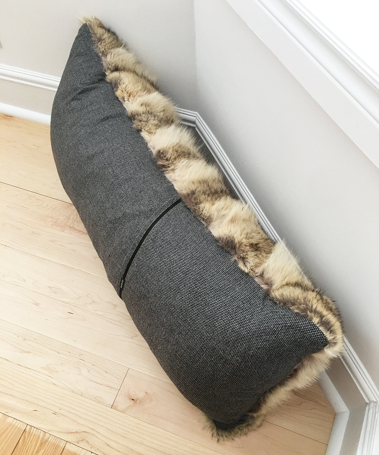 real fluffy coyote fur pillow made from vintage fur coats. Giant fur pillow made in Canada. Fur coat recycling idea. What should I do with my fur coat?