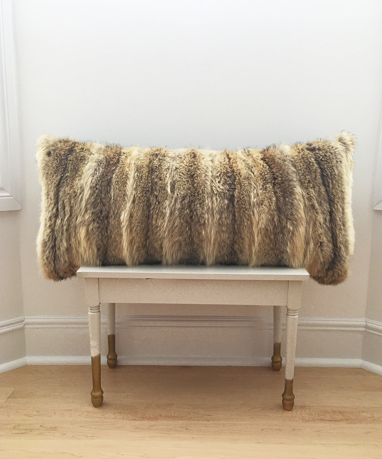 real fluffy coyote fur pillow made from vintage fur coats. Giant fur pillow made in Canada. Fur coat recycling idea. What should I do with my fur coat?