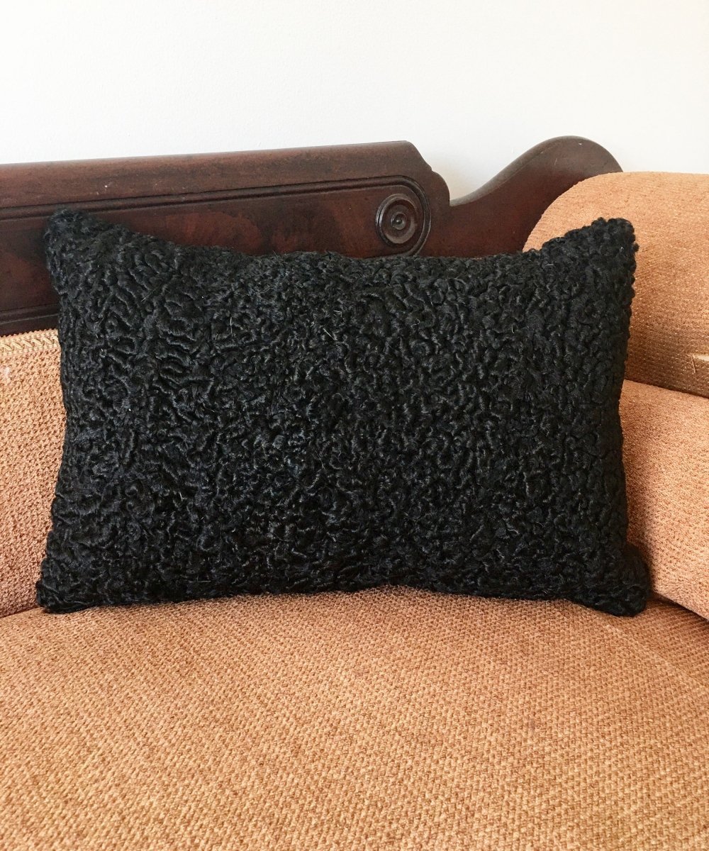 Rblack Persian lamb fur throw cushion  made from vintage fur coats. fur upcycle idea, what should I do with my fur coat? Fur coat ideas. Made in Canada