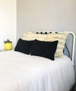 black Persian lamb fur throw cushion  made from vintage fur coats. fur upcycle idea, what should I do with my fur coat? Fur coat ideas. Made in Canada